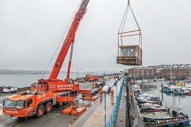 The Floatel Cabins being lifted into Milford Marina