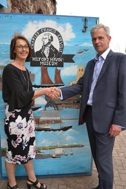 Clare Stowell from the Port of Milford Haven and Tim Ash from The National Museum of the Royal Navy celebrate the new collaboration